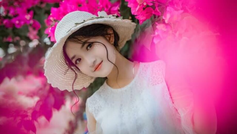 woman-surrounded-by-pink-bougainvillea-flowers-1382728 (1)