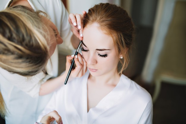 portrait preparation bride morning before wedding artist makes makeup she keeps eyed closed 197531 569 Makeup Mistakes Every Bride Should Avoid