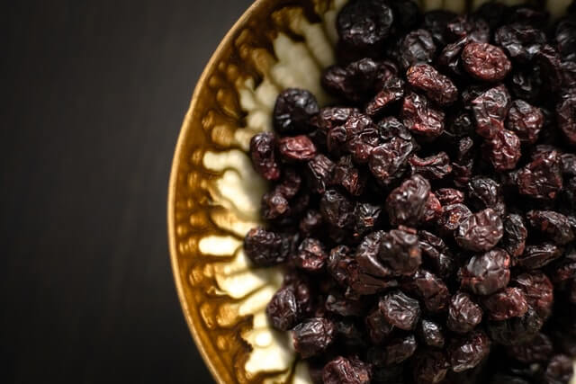 andreas haslinger VI04c0uWTso unsplash 1 6 Awesome Benefits of Black Raisins for You